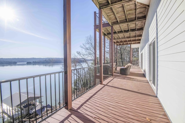 deck featuring a water view