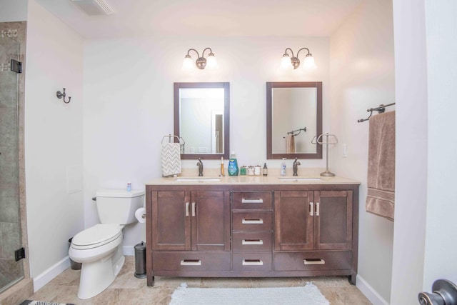 full bathroom featuring visible vents, a sink, a shower stall, and toilet