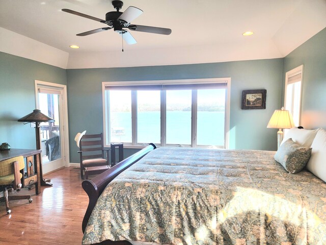bedroom with recessed lighting, a ceiling fan, vaulted ceiling, wood finished floors, and baseboards