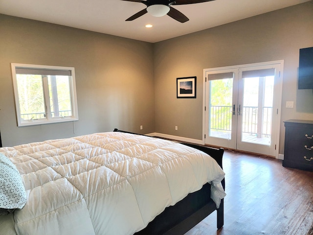 bedroom featuring access to exterior, french doors, recessed lighting, wood finished floors, and baseboards