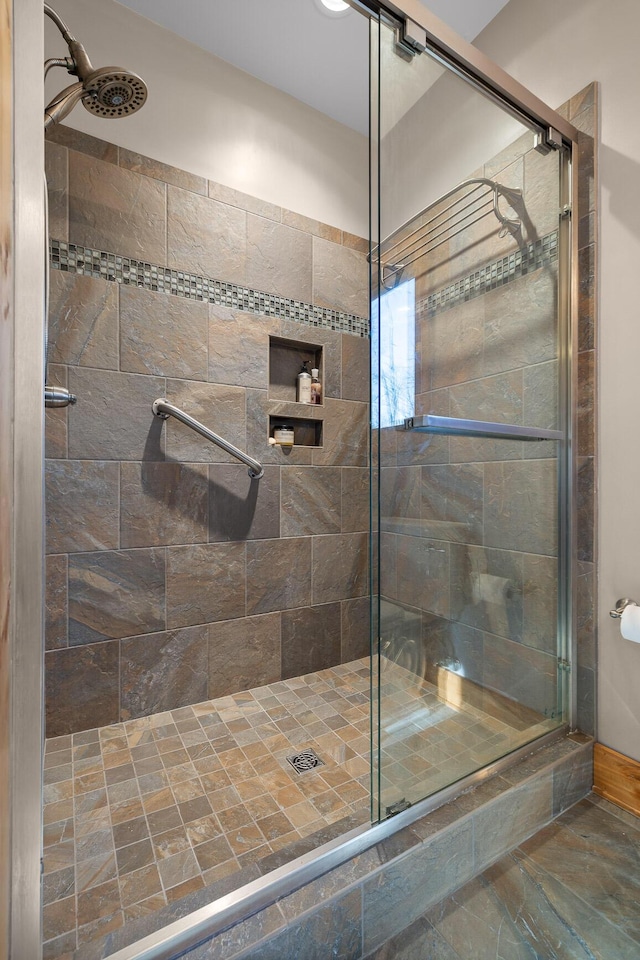 bathroom featuring a stall shower