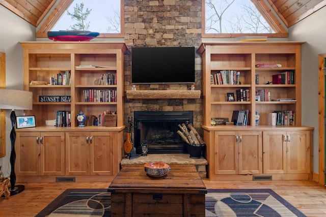 living room with lofted ceiling, wooden ceiling, visible vents, and light wood-style flooring