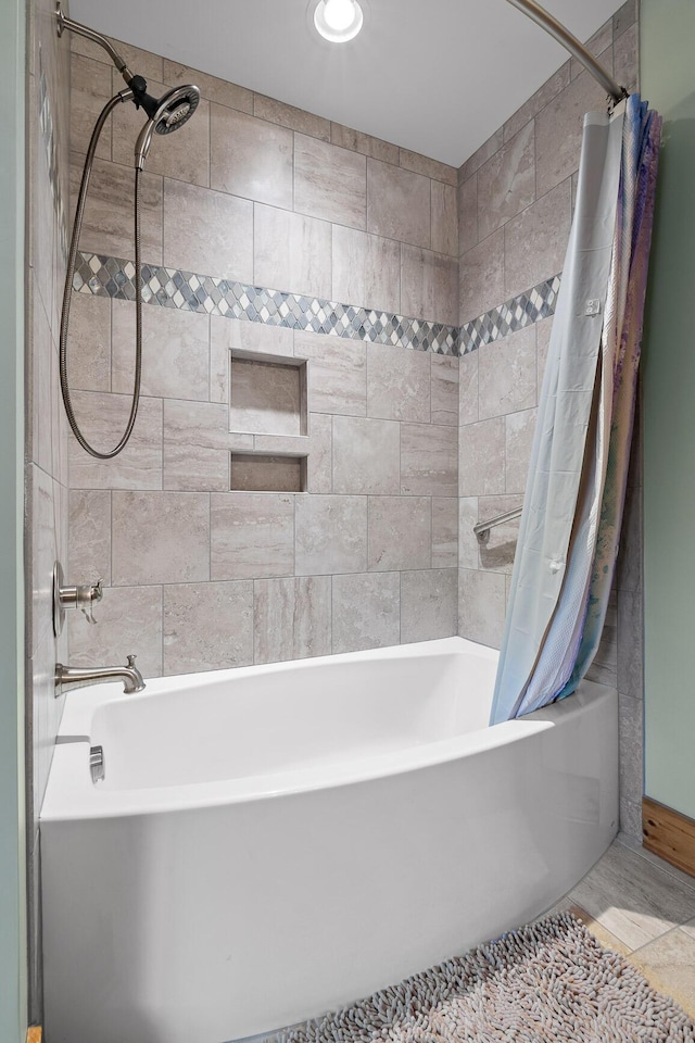 bathroom featuring shower / bath combo with shower curtain