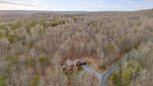 bird's eye view featuring a forest view