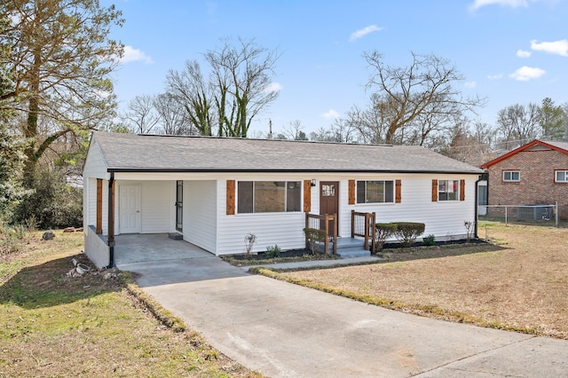 view of front of property with driveway, central AC unit, roof with shingles, fence, and a front lawn