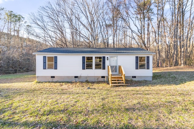 view of front of house with crawl space and a front yard