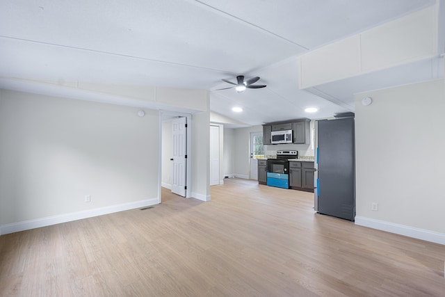 unfurnished living room featuring visible vents, baseboards, lofted ceiling, ceiling fan, and light wood-type flooring