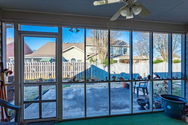 interior details featuring a ceiling fan