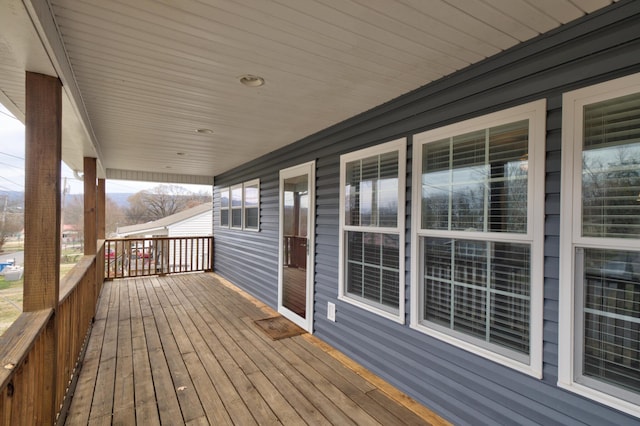 wooden deck featuring a porch