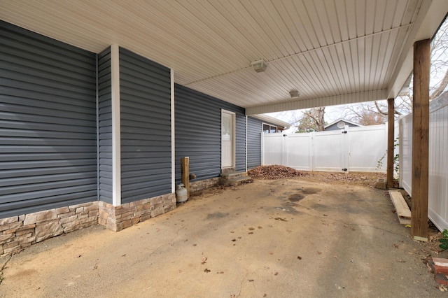 view of patio / terrace with entry steps and fence