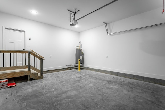 garage with electric water heater and a garage door opener