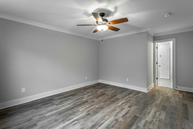 spare room featuring dark wood-style floors, ceiling fan, baseboards, and ornamental molding