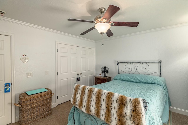 bedroom featuring ornamental molding, a closet, and carpet flooring