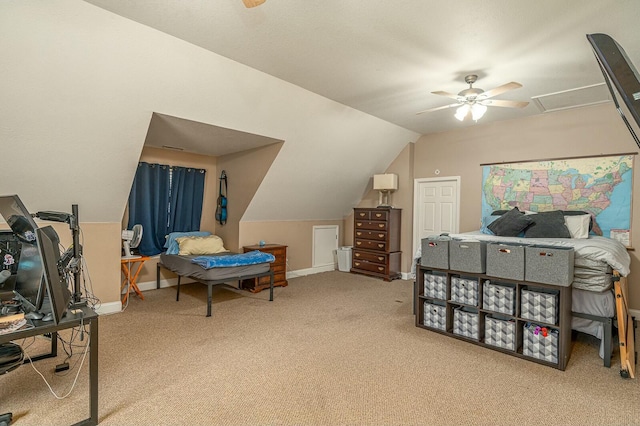 bedroom featuring lofted ceiling, a ceiling fan, baseboards, and carpet flooring