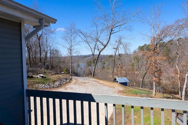 view of yard with a forest view