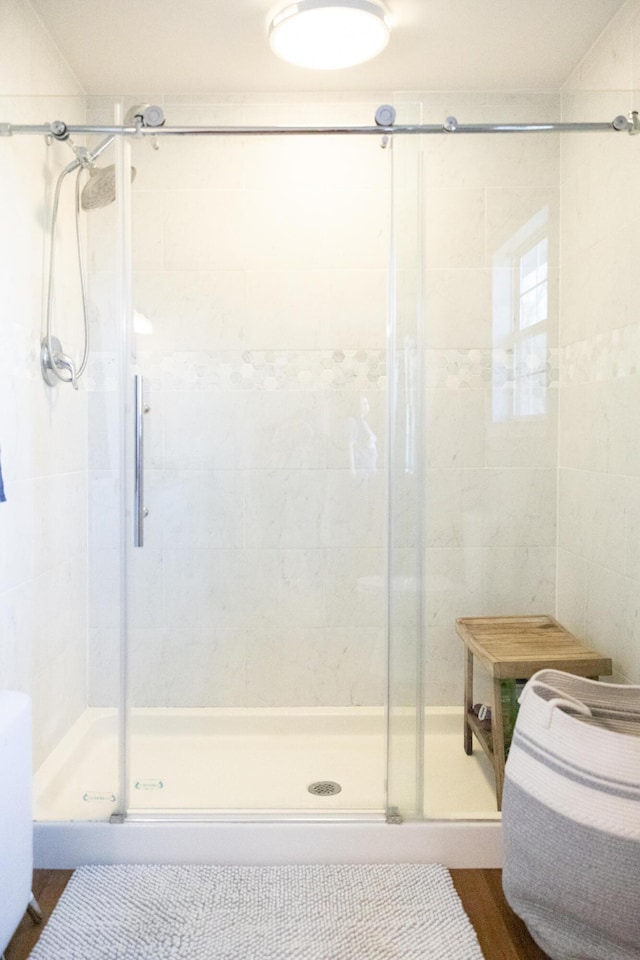 bathroom featuring a stall shower