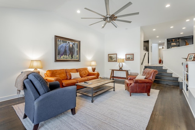 living area with stairs, dark wood-type flooring, baseboards, and recessed lighting