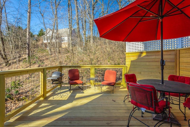 deck featuring outdoor dining space