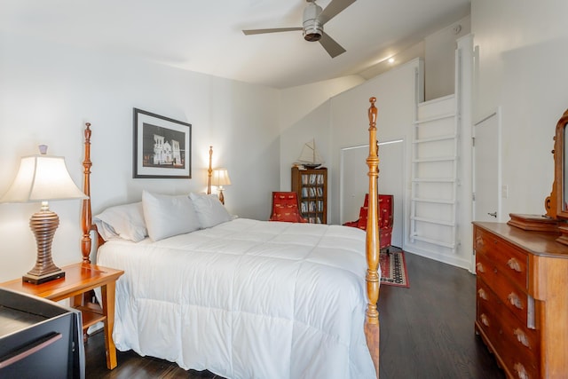 bedroom featuring dark wood finished floors and ceiling fan