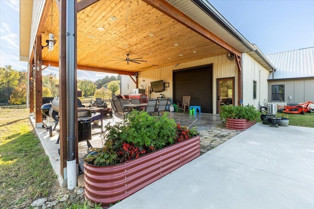 view of patio with ceiling fan and outdoor dining space