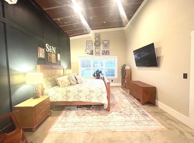 bedroom featuring a towering ceiling and baseboards