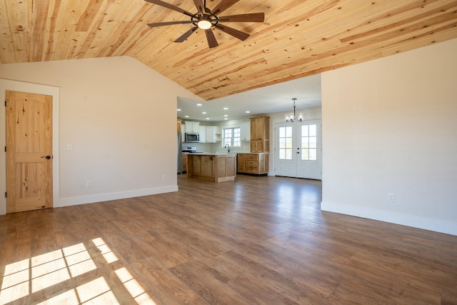 unfurnished living room featuring vaulted ceiling, dark wood finished floors, wood ceiling, and baseboards