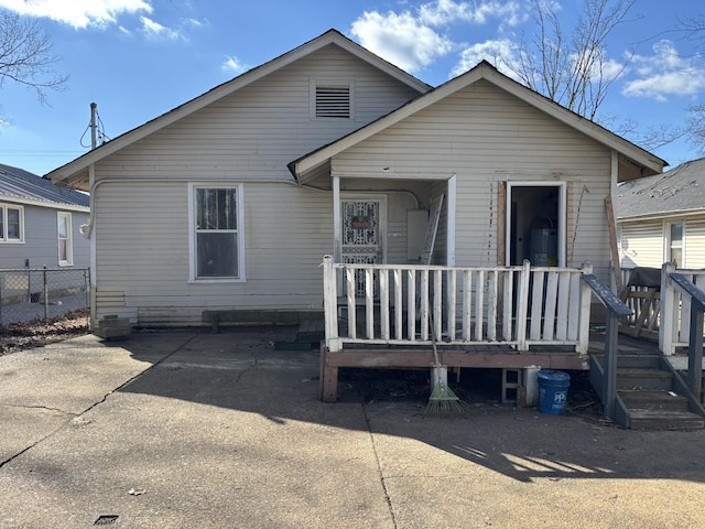 back of property with fence