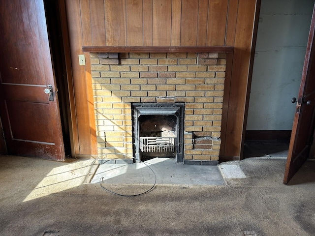 room details featuring a brick fireplace