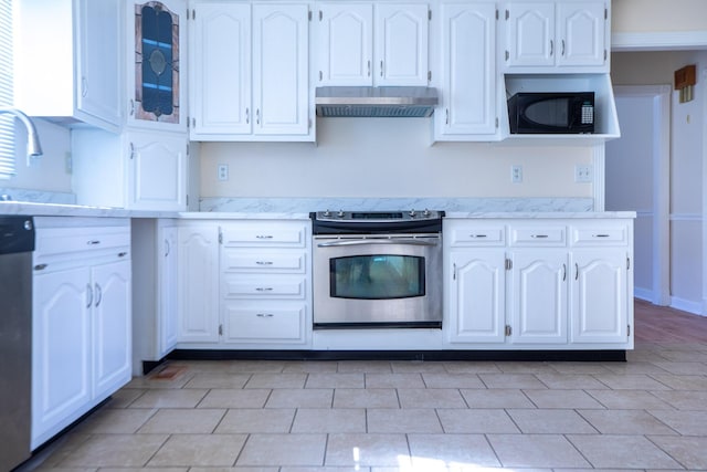 kitchen featuring light stone counters, appliances with stainless steel finishes, white cabinets, a sink, and under cabinet range hood