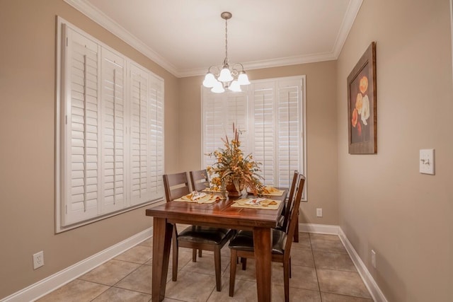 dining space featuring light tile patterned floors, baseboards, and ornamental molding