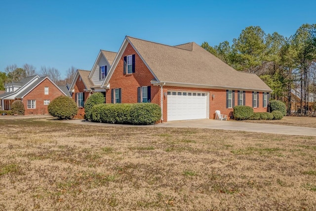 view of front of house featuring an attached garage, brick siding, a shingled roof, driveway, and a front yard