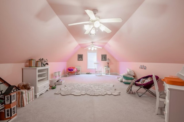 game room with lofted ceiling, carpet flooring, and a ceiling fan