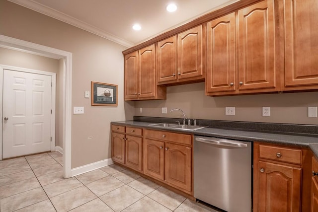 kitchen featuring a sink, dark countertops, light tile patterned floors, and dishwasher