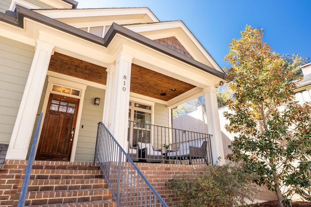 entrance to property with covered porch