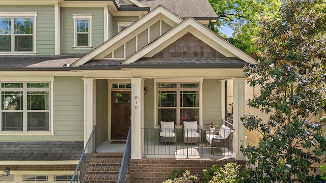 810 Boylston St, Chattanooga, TN 37405 - property entrance with a porch and a shingled roof