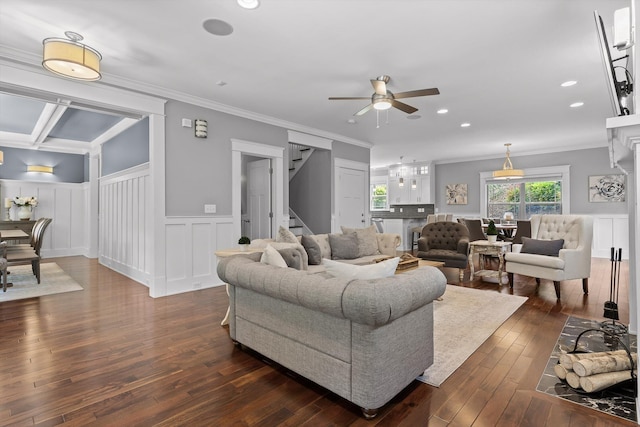 810 Boylston St, Chattanooga, TN 37405 - living room with a ceiling fan, dark wood-style flooring, wainscoting, stairs, and a decorative wall