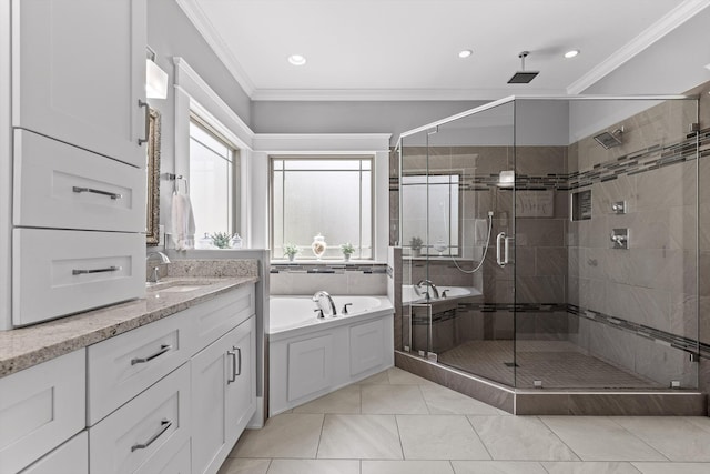 810 Boylston St, Chattanooga, TN 37405 - bathroom with crown molding, vanity, a shower stall, a bath, and recessed lighting