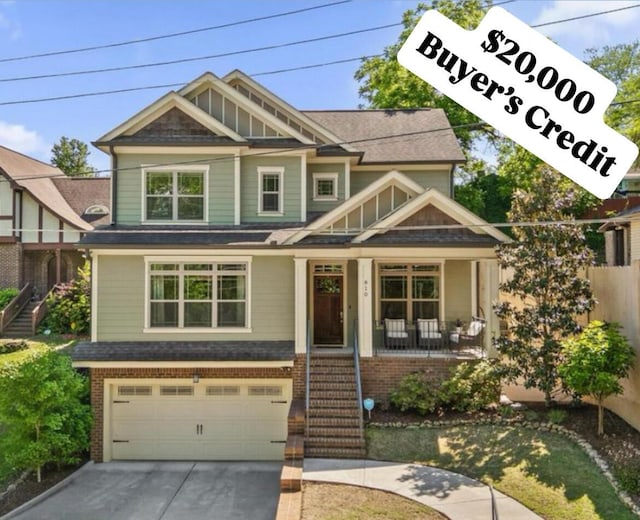 810 Boylston St, Chattanooga, TN 37405 - craftsman house featuring brick siding, covered porch, an attached garage, and driveway