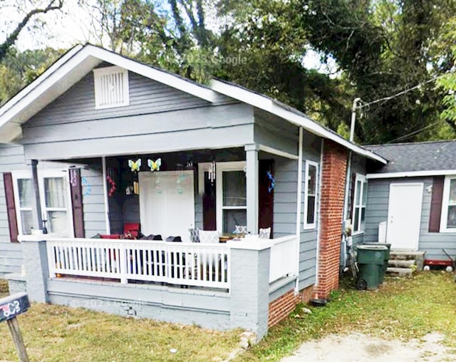 bungalow-style home featuring covered porch