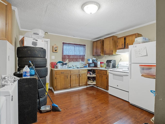 kitchen featuring wood finished floors, white appliances, brown cabinets, and under cabinet range hood