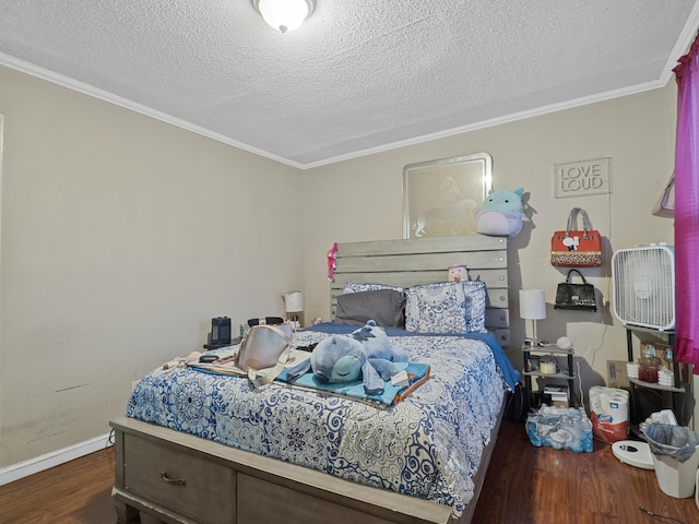 bedroom featuring crown molding, a textured ceiling, and wood finished floors