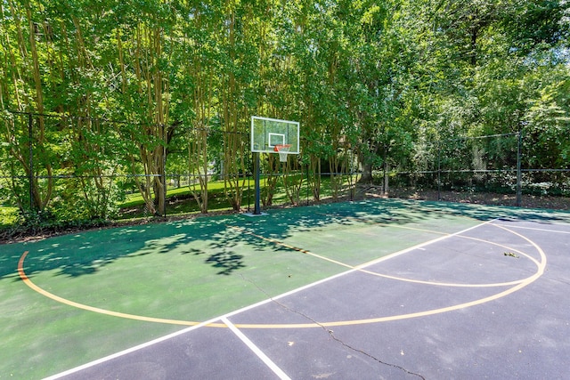 view of sport court featuring community basketball court and fence