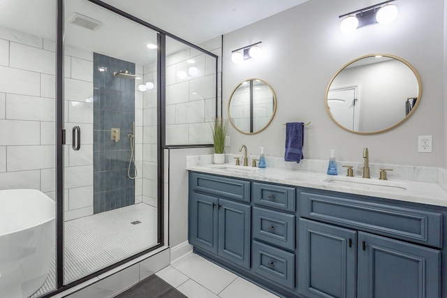 full bath with a stall shower, a sink, and visible vents