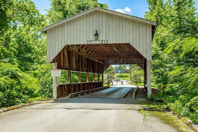 view of vehicle parking with a carport