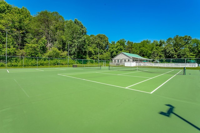 view of sport court with community basketball court and fence