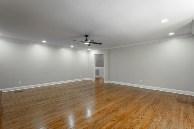 unfurnished room featuring recessed lighting, baseboards, and wood finished floors