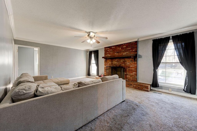 unfurnished living room with carpet floors, a fireplace, and crown molding