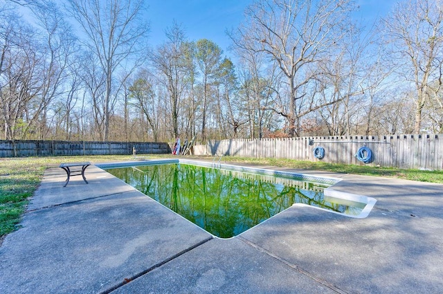 view of pool featuring a fenced in pool, a patio area, and a fenced backyard