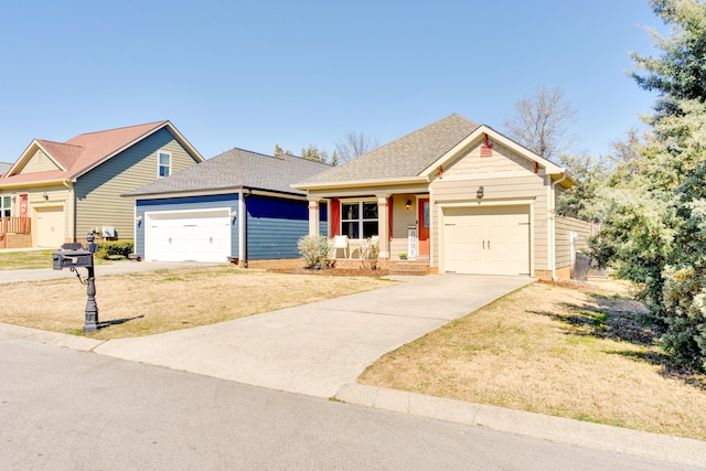 single story home with concrete driveway, a shingled roof, a front lawn, and an attached garage