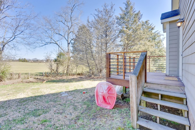 view of yard with a wooden deck